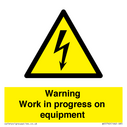warning-work-in-progress-on-equipmentwith-electrical-hazard-symbol~